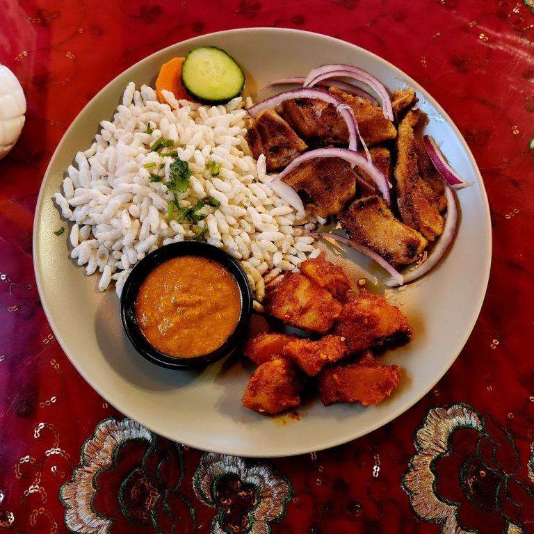 Rice plate with grilled chicken and curry at Northern Himalayan Cafe